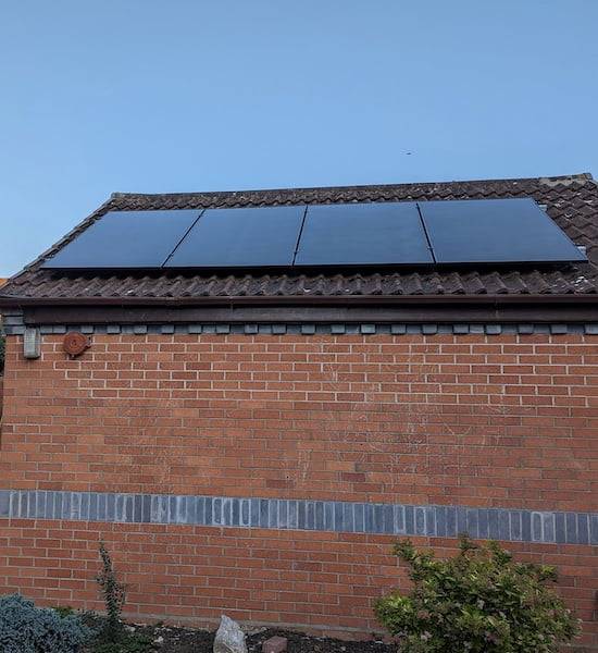 solar panels from the ground perspective A picture of solar panels on a single storey building. The emphasis is on how the perspective skews our way of perceiving the real size of the object.