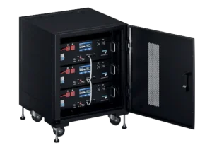 An image of a server rack type battery comprising of 3 battery units in a server rack. The door is pen and we can see the batteries inside.